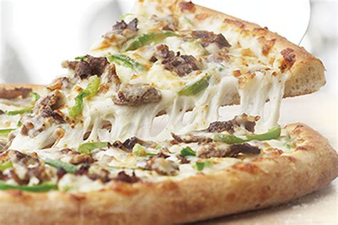 Cheesesteak pizza - Learn how to make a homemade Philly cheese steak pizza with a garlic white sauce, sautéed peppers, onions, and mushrooms. This recipe …
